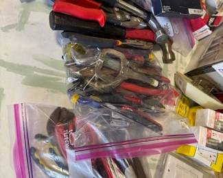 Many hand tools and household hardware. 