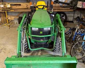 John Deere 1025R. Diesel. Low hours. Great shape. Bucket. Forks. Blade. Post hole digger. 