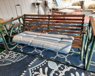 Old wood and metal swing