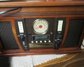 Music Center: Turntable, CD & Cassette Player, AM/FM Radio & Speakers