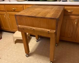 Vintage wood butchers block on wheels
