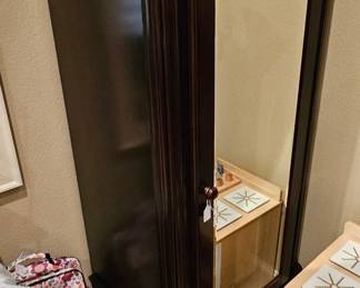 Mirrored wardrobe matching baby's room furniture