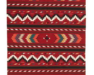 205
A Navajo regional rug
Early 21st century
Woven in multicolor wool, depicting alternating serration and step motif bands on a red ground
91" H x 64.5" W
Estimate: $1,000 - $1,500