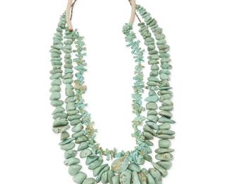 310
Three Southwest Pueblo turquoise necklaces
Late 20th century
Featuring a single strand necklace of stacked carved turquoise animal fetish figures, including a central carved turtle, flanked by various smaller carved animals such as birds, foxes, bison, bighorn sheep, rabbits, and bears, with a traditional wrapped neck cord (30" L x 1.5"H), and two chunky turquoise graduated stone bead necklaces, each with heishi shell and silver cone clasps (34" L & 33" L), 3 pieces
479.8 grams gross
Estimate: $200 - $400