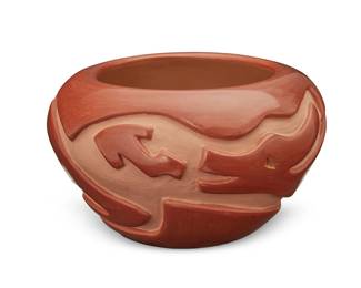 81
Douglas Tafoya (b. 1942, Santa Clara Pueblo)
A redware pottery bowl, late 20th/early 21st century
Incised to underside: Douglas Tafoya / Santa Clara
The bowl with deeply carved avanyu motif
5" H x 8.375" Dia.
Estimate: $200 - $300