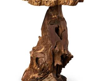 202
A natural burlwood pedestal
Late 20th century
The burlwood standard mounted with a live edge tabletop
32.5" H x 26" W x 22" D
Estimate: $500 - $700