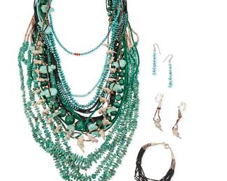 280
A large group of Southwest turquoise and stone bead jewelry
Mid/late 20th century
Thirteen works comprising ten necklaces in various stones and lengths including four necklaces of single and multi-stranded heishi beads in turquoise, malachite, jet, and silver, one with a matching jet and silver multistrand bracelet, as well as a chunky malachite graduated bead necklace with gold-tone beads and cone clasp, three necklaces with small turquoise nuggets or beads, including a five-strand necklace with shell heishi and a carved turquoise bear pendant, together with two heishi and carved stone fetish animal necklaces, one with a pair of matching earrings, and a pair of turquoise nugget earrings, 15 pieces
Largest: 28.5" L to 31.5" L; smallest: 16.75" L; bracelet: 7.25" L; earrings: 2.5" H & 2.25" H
394.6 grams gross
Estimate: $600 - $800