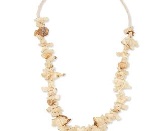 263
A Zuni Pueblo-style carved bone stacked fetish necklace
Late 20th century
Featuring an elaborate single strand necklace of stacked carved bone animal fetish figures, including a central carved standing bear, flanked by smaller bears and various animals such as mountain lions, beavers, foxes, turtles, frogs, and wolves, with a traditional wrapped neck cord
30" L x 1.625" H
134.0 grams gross
Estimate: $200 - $400