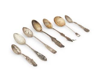 201
A group of Southwest commemorative silver spoons
Early 20th century
All but the Southwest motif spoon marked for sterling
Comprising six sterling silver spoons, three with gilt wash bowls, variously reading "Used by William Howard Taft President of the United States October 14, 1911- In turning the first spadeful of earth for the Panama Pacific International Exposition to be held in San Francisco 1915," "Grand Canyon of Arizona / View From Bright Angel Trail / Hopi Snake Dance," "Hotel El Tovar / Grand Canyon Arizona," "Mormon Temple Salt Lake City / Moroni Utah," "Salt Lake City," "Pikes Peak Signal Station Alt 14147," and coin silver spoon stamped with Southwest motifs
7 pieces
Longest: 5.875" L
Weighable sterling: 3.4 oz. troy
Estimate: $200 - $300