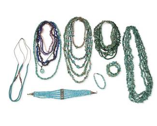 332
A large group of Southwest-style turquoise and stone bead jewelry
Mid/late 20th century
Comprising beaded and carved stone stranded necklaces in various styles and sizes, with multiple beads such as turquoise, malachite, lapis lazuli, amethyst, shell, and silver, including a turquoise and silver multi-strand choker, and a carved malachite animal fetish necklace, as well as an expandable spiral strand bracelet and a single strand nugget bracelet, 26 pieces
Largest: 33" L; smallest: 13" L; single bracelet: 7.5" L
1464.4 grams gross
Estimate: $100 - $200