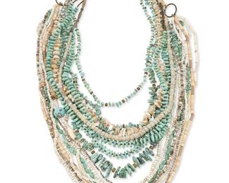 278
A group of Southwest turquoise and stone necklaces
Late 20th century
Six works comprising a large multistrand necklace with turquoise, shell, and white stone beads, with a trade bead accent, as well as a single strand of graduated mottled gray stone beads with silver bead terminals, a single strand of carved shell nuggets and heishi shell spacers, and three further necklaces of small turquoise nugget beads, including a triple-strand, a double strand and a single strand, 6 pieces
Largest: 38.25" L; smallest: 29" L
480.3 grams gross
Estimate: $300 - $500