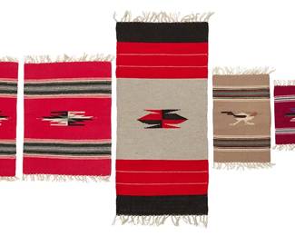 214
A group of Chimayo textiles
Mid/late 20th century; New Mexico
Each woven in multicolor wool with fringe to short ends, comprising three with banded and central geometric motifs, and one depicting a roadrunner figure
5 pieces
Largest: 33" H x 15.5" W; Smallest: 10.25" H x 10" W
Estimate: $200 - $300