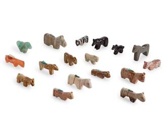 289
A group of Zuni carved stone horse fetish figures
Mid/late 20th century
Some variously signed by the artist
Comprising seventeen horse figures from various makers such as Lorendina Seche, Emory Boone, Thelma Sheebe, Virginia Toombs, and Dan Poncho, most with turquoise inlaid features, eleven mounted with offerings
17 pieces
Largest: 2.25" H x 3.75" W x 0.625" D; Smallest: 1.5" H x 2.125" W x 0.625" D
Estimate: $200 - $400