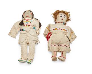 283
Two Native American beaded hide dolls
Mid-20th century
The dolls with beaded geometric motifs to chests, beaded accents to moccasins, and adorned with beaded necklaces and hair
2 pieces
Each: 11.5" H x 7" W x 2.25" D approx.
Estimate: $50 - $75