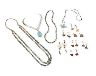 345
A group of Southwest-style silver and stone jewelry
Late 20th century
Variously marked for sterling
Comprising a silver collar torque-style necklace with turquoise drop, a carved turquoise and coral hummingbird pendant on an adjustable leather cord, and two silver and turquoise bead necklaces, as well as seven pairs of carved stone animal fetish earrings in various styles and stones including bears and rabbits, 18 pieces
Necklaces: 33.5" L to 12" L x 2" H; earrings: 2" H to 0.625" H
250.3 grams gross
Estimate: $200 - $400