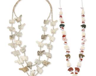 267
Two Zuni Pueblo carved fetish necklaces
Late 20th century
Comprising a double strand carved antler bear necklace with a central standing bear and heishi shell spacers and silver cone clasp (26" L), and a single strand necklace with various graduated carved multistone and bone animals including bears and birds, with white shell heishi spacers and silver cone clasp (28" L), 2 pieces
143.4 grams gross
Estimate: $200 - $400