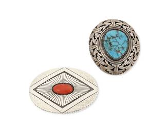 320
Two Southwest Navajo sterling silver and set stone jewelry items
Late 20th century
Two works:

Larry Joe (b. 20th century, Diné)
A Navajo sterling silver and coral belt buckle
Stamped: LRJ [within diamond] / Sterling
A hollow silver buckle with elaborate chased silver designs and a central set coral cabochon
2.125" H x 3" W

Adam Fiero (b. 20th century, Diné)
A Navajo sterling silver and turquoise bolo pendant
Stamped: AF / Sterling
A chunky bolo slide clip with teardrop set turquoise cabochon and elaborate silver shadowbox overlay edging, lacking leather tie
2.75" H x 2.375" W

2 pieces total
157.8 grams gross
Estimate: $400 - $600