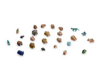 302
A group of diminutive Zuni carved stone animal fetish figures
Mid/late 20th century
Comprising twenty-five figures of various animals including beavers, bears, frogs, turtles, and others, from various makers including Emory Boone, most with turquoise or jet inlaid features, five mounted with offerings
25 pieces
Each: <1.25" cubed
Estimate: $200 - $400