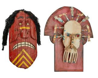 228
Two contemporary Inuit-style masks
20th century
Each unmarked
The polychrome carved wood wall-mounted masks, comprising one anthropomorphic squid face mounted with fish figures and another mask depicted frowning with teeth bared and yarn hair
2 pieces
Squid: 32.625" H x 19" W x 4.25" D; Yarn: 19.5" H x 10" W x 3.25" D
Estimate: $200 - $300