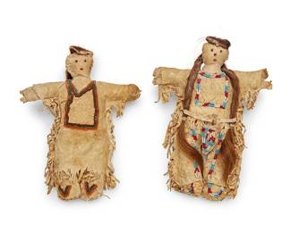 282
Two Plains beaded hide dolls
Early 20th century; Great Plains
The dolls with beaded rectangles to chests, fringe edges, and applied hair, one featuring a knife sheath
2 pieces
Each: 10" H x 7" W s 2.5" D approx.
Estimate: $200 - $300