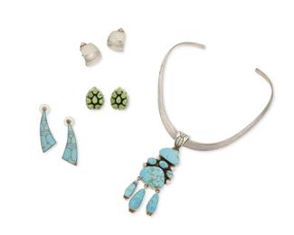 331
A group of Southwest-style jewelry
Late 20th century
Four works:

A Gabriel Jurado Mexican sterling silver and set turquoise pendant, suspended from a Zina sterling silver modernist collar, 2 pieces
Each stamped for maker and for sterling
Pendant: 4.25" H x 1.25" W; collar: 13.5" L

A group of Southwest-style earrings
Two variously marked for maker and for sterling
Comprising a pair of John G. Begay Navajo (b. 20th century, Diné) hammered sterling silver wide hoop clip earrings (each: 1" Dia.), a pair of sterling silver earrings with inlaid turquoise (each: 2" H), and a pair of silver earrings with cluster-set teardrop green stones (each: 1" H), 6 pieces

8 pieces total
126.3 grams gross
Estimate: $500 - $700