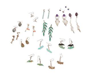 341
An assortment of Southwest-style silver and stone earrings
Late 20th century
Variously marked for sterling and for maker
Fifteen pairs of earrings in various sizes and styles including a pair of sterling silver articulated leaf drop earrings with malachite inlay, as well as carved turquoise and stone fetish animals with heishi, set turquoise, purples stones with dangles, and one with elongated lizards, plus silver squash blossoms, diminutive hummingbirds, and two pairs of gem-set studs, 30 pieces
Largest: 3.5" H; smallest: 0.25" Dia.
59.2 grams gross
Estimate: $200 - $400