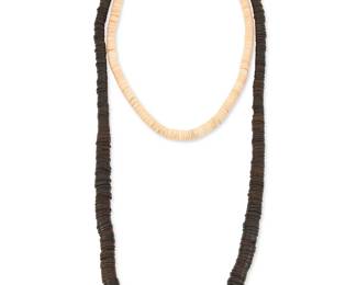 335
Two Southwest Pueblo heishi necklaces
Late 20th century
Unmarked
Comprising a Kewa/Santo Domingo Pueblo single strand of graduated hand rolled thin black jet heishi beads, strung on thread, with black beads to neck, and a smaller single strand of graduated cream/pink shell heishi with a metal hook clasp, 2 pieces
Larger: 34" L; smaller: 21.5" L
183.7 grams gross
Estimate: $100 - $200