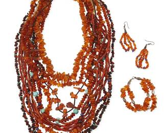 275
A large group of Southwest amber, coral, and turquoise jewelry
Mid/late 20th century
Comprising six amber bead necklaces including a Joanne Tenorio Kewa-Santo Domingo Pueblo amber and lapis lazuli round bead necklace, a carved amber animal fetish necklace with black heishi spacers, a single strand of graduated amber nuggets, and three further strands, some with turquoise beads, including two extra-long rope necklaces, as well as a multistrand coral necklace with a traditional wrapped neck cord, and an amber and silver bead two-strand bracelet and a pair of amber and lapis lazuli earrings, 10 pieces
Largest necklace: 77" L; smallest: 23" L; bracelet: 7.5" L; earrings: 3" H
400.1 grams gross
Estimate: $500 - $700