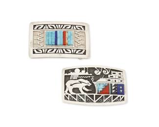 254
Two Navajo sterling silver and stone inlay belt buckles
Late 20th century
Two works:

Richard and Rita Begay (b. 20th century, Diné)
A Navajo cast sterling silver buckle with cobblestone inlay.
Stamped: RB / Sterling
With turquoise, coral, lapis lazuli and stone sculptural cobblestone inlay and geometric overlay motifs to edges
2" H x 3" W; bar width: 1.5"

Tim Yazzie (b. 20th century, Diné)
A Navajo cast sterling silver pictorial/storyteller overlay buckle
Stamped: Tim Yazzie / Sterling / Benavidez
With turquoise, coral, lapis lazuli and purple stone inlay
2" H x 3" W; bar width: 1.375"

2 pieces total
153.3 grams gross
Estimate: $400 - $600