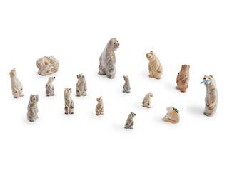 287
A group of Zuni carved bone bear fetish figures
Mid/late 20th century
Some variously signed by the artist
Comprising fifteen bear figures from various makers such as Arnie & Claudia Calavaza, Andres Quam, and Calvin Peine, most with turquoise inlaid features, together with one carved mother of pearl figure mounted with offerings
15 pieces
Largest: 4" H x 2.5" W x 1.5" D; Smallest: 1.375" H x 0.875" W x 0.625" D
Estimate: $200 - $400
