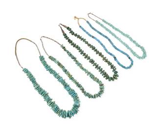 299
A group of Southwest turquoise and trade bead necklaces
Mid/late 20th century
Comprising four single strand necklaces each with chunky turquoise nuggets in various sizes, and with heishi or silver bead spacers, as well as a single strand of blue glass trade beads on a raffia cord, 5 pieces
Largest: 32" L; smallest: 27" L
782.5 grams gross
Estimate: $200 - $400