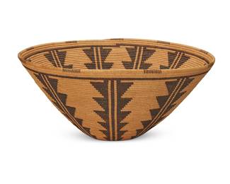 221
A Panamint basket
Early 20th century; Central California
The coiled basket with stacked columns of points and rim ticking
6" H x 13" Dia.
Estimate: $2,000 - $3,000