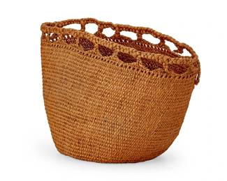 233
An Attu basket
Mid-20th century; Alaska
The twined oval basket with openwork rim
10.5" H x 14" W x 7.75" D
Estimate: $100 - $150