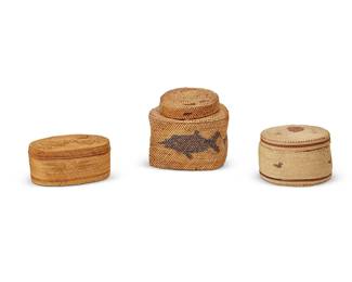 238
Three Makah lidded baskets
Early 20th century; Pacific Northwest Coast
The twined baskets, comprising one depicting alternating whales and fishing boats with squared bottom and circular rim, another small oval basket depicting avian and arrow motifs, and a small circular basket depicting seabirds
3 pieces
Largest: 3.375" H x 3.875" Dia.; Smallest (oval): 2" H x 3.625" W x 2.375" D
Estimate: $200 - $300