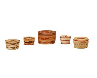 239
A group of Northwest Coast polychrome lidded baskets
20th century
The twined baskets with various banded geometric motifs, one pictorial depicting a whale and a figure
5 pieces
Largest: 3.5" H x 5.75" Dia.; Smallest: 2.125" H x 3.375" Dia.
Estimate: $200 - $300