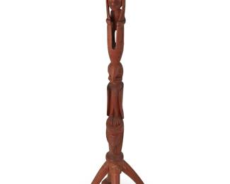 242
A Pacific Northwest Coast carved wood side table
20th century
Unmarked
The totemic figural standard surmounted by a circular top depicting an eagle, raised on four legs with ball in claw feet
28" H x 10.75" Dia.
Estimate: $300 - $500