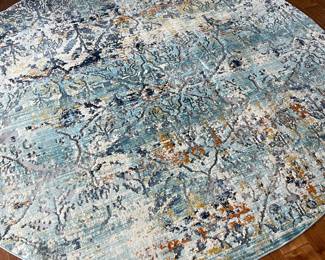 ROUND ACCENT RUG 7’8”