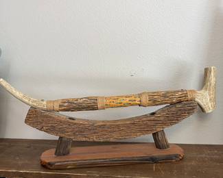 AUTHENTIC CARVED ANTLER TRIBAL PIPE ON WOOD BASE