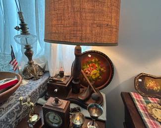Man Cave Stuff, perfect for a cabin or rustic decor! Lots of brass. That lamp is to die for, there are two similar one looks like cobbler tools the other looks like construction tools. VERY unique!