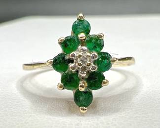 Sparkling Green 14Kt Gold Ring with Diamond Center
