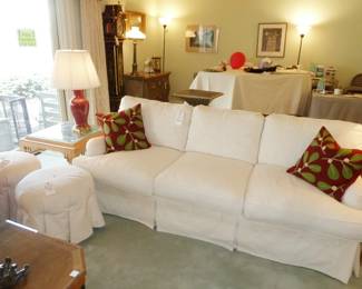 White Slipcovered Sofa $180 (Floral pattern underneath)