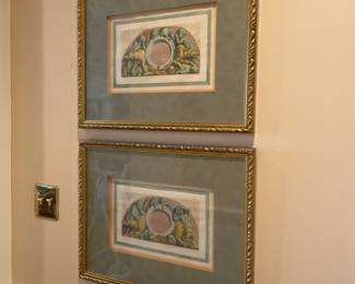 A pair of beautifully framed 19th century hand-colored engravings of wolves and cherubs. Engraving without frame and matting 15” x 9 1/2.”