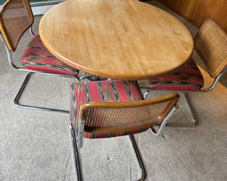 Vintage table and cane chairs