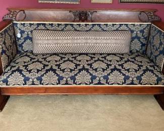 Antique Empire style sofa 82x36x39, likely from mid-19th century (circa 1840-1860). Solid wood frame, Carved details, Rich navy blue and gold fabric, Columned arms with inlay work.