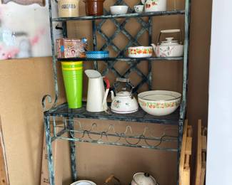 Bakers Rack with pots, pans, teapots