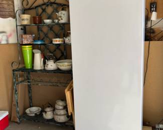 Frigidaire Refrigerator, Bakers rack with pots, pans and dishes