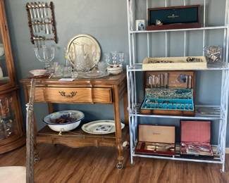 Serving cart, Baker's rack, spoon rack with lots of spoons, silver plate flatware in cases