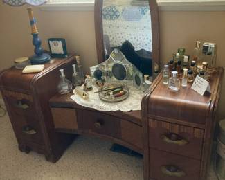 Vintage dressing table with mirror (not attached), perfume bottles