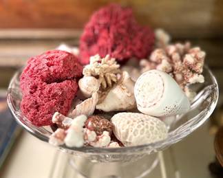 Coral and seashells in crystal bowl