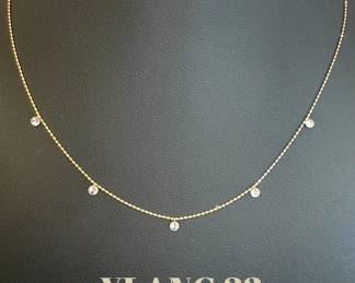 14k Gold and Zircon station necklace. It’s gorgeous!